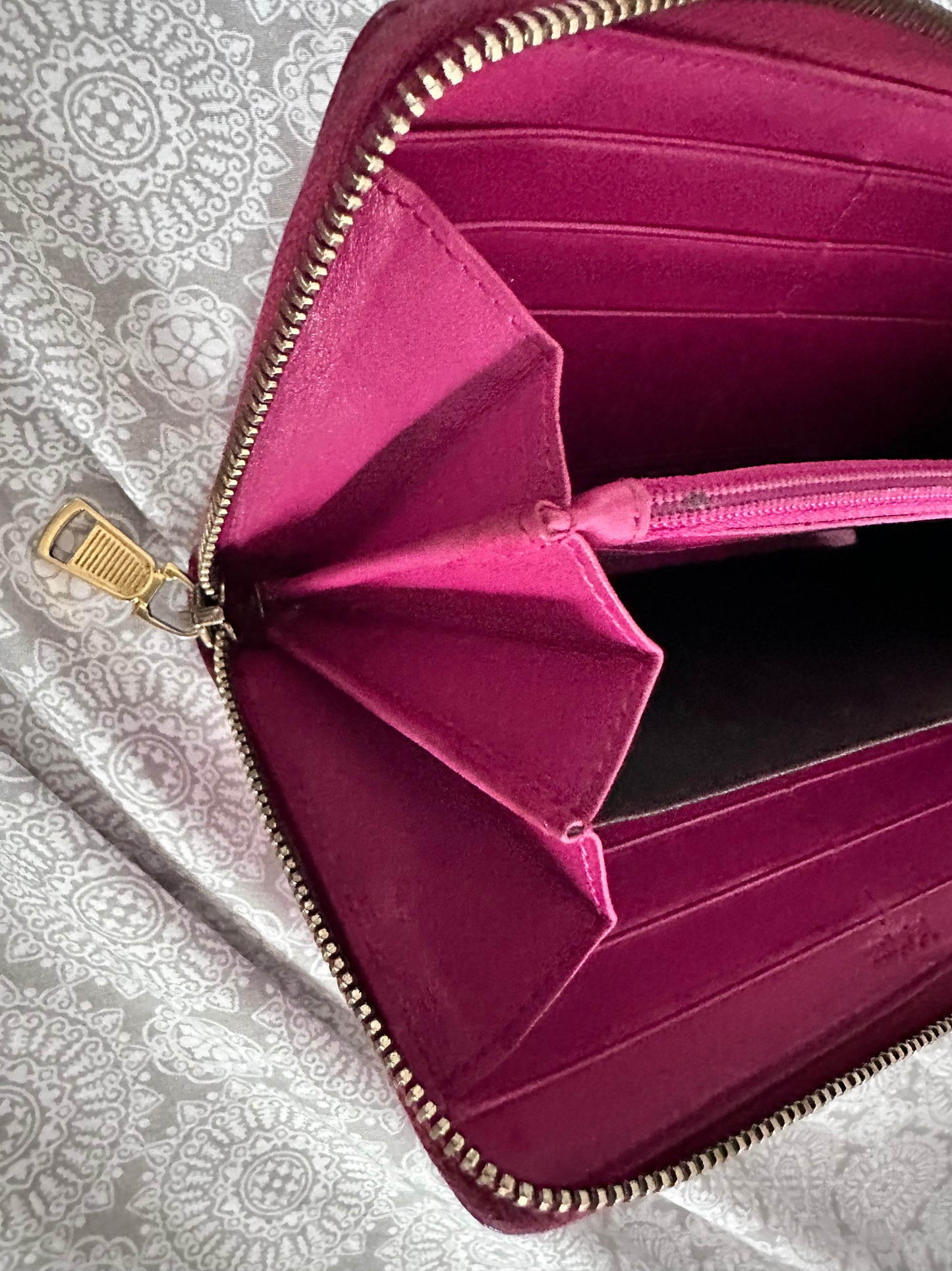 YSL patent zippy wallet